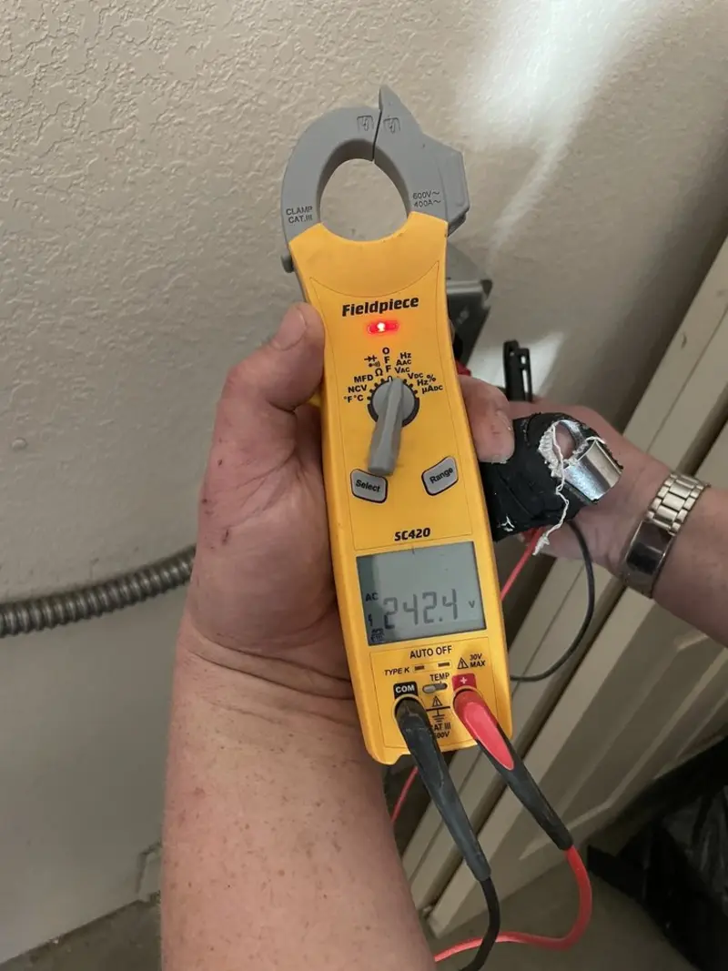 Voltage testing with clamp meter during Circuit Breaker Repair in Hamtramck